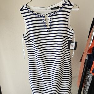 Blue and white dress with gorgeous beading on neck line.